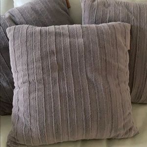 Three Koolaburra by UGG throw pillows.